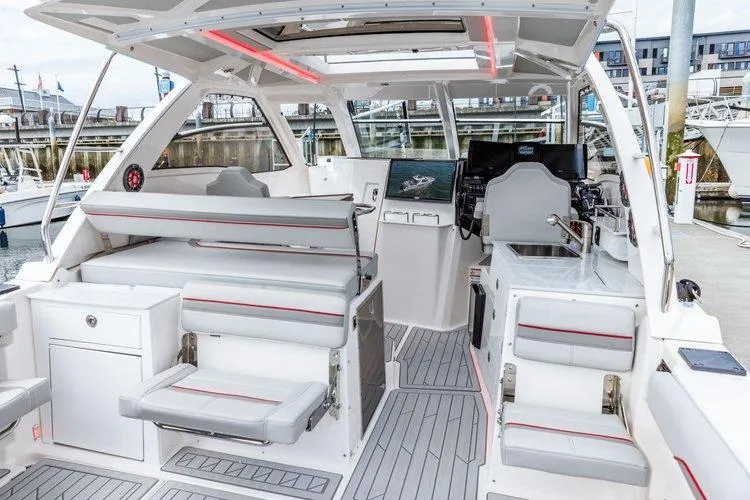 Slide: The Image of 2026 Solara S 310 Sport Coupe interior with modern seating and navigation equipment. - 4