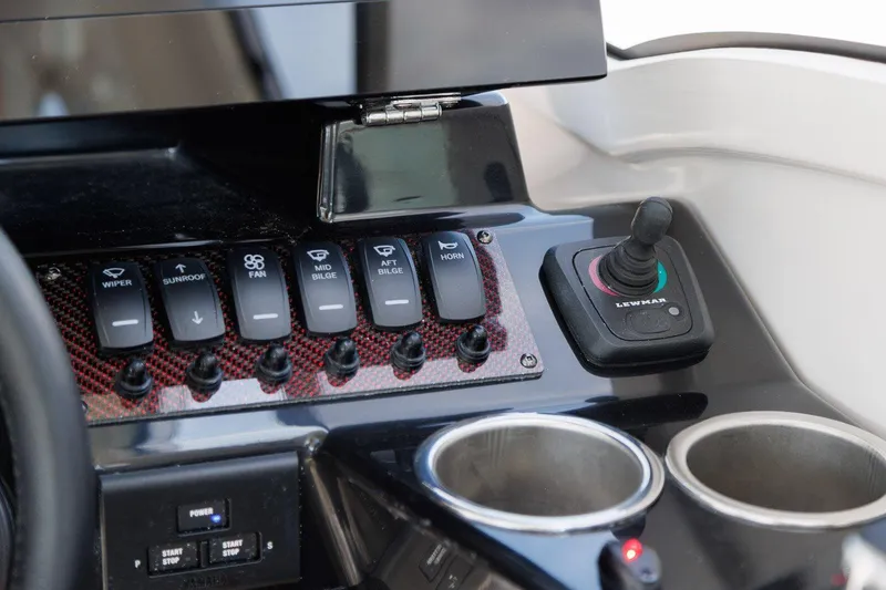 Slide: The Image of Control panel of 2026 Solara S 310 Sport Coupe with switches and joystick. - 6