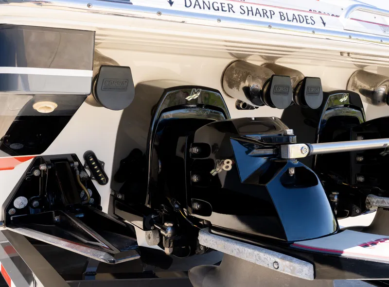 Slide: The Image of 2017 Formula 382 FASTech boat stern with sharp blade warning and engine details. - 11