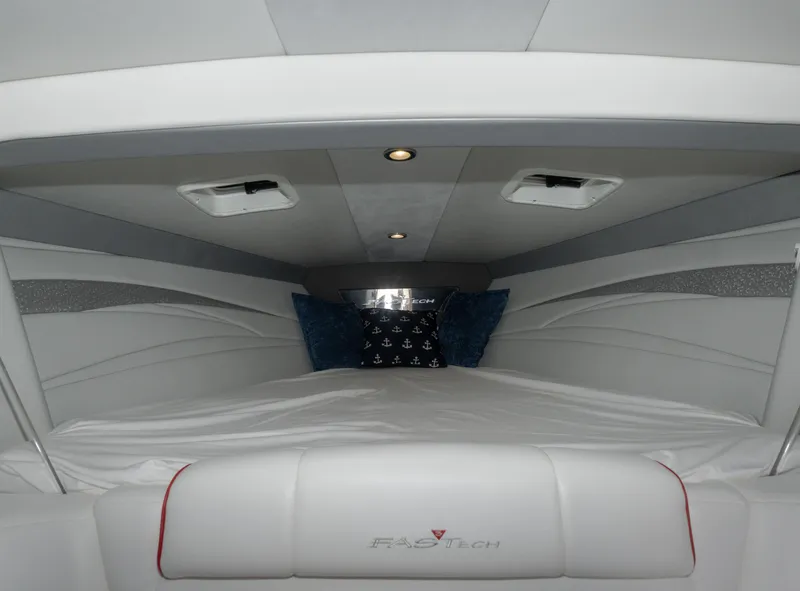 Slide: The Image of Interior cabin of 2017 Formula 382 FASTech boat, featuring sleek white design and ambient lighting. - 15