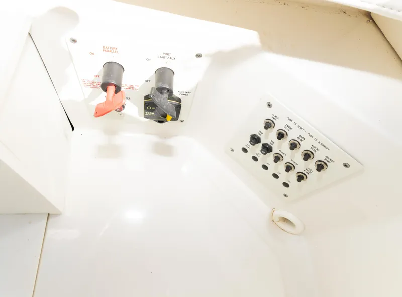 Slide: The Image of Control panel of a 2017 Formula 382 FASTech boat with switches and dials. - 31