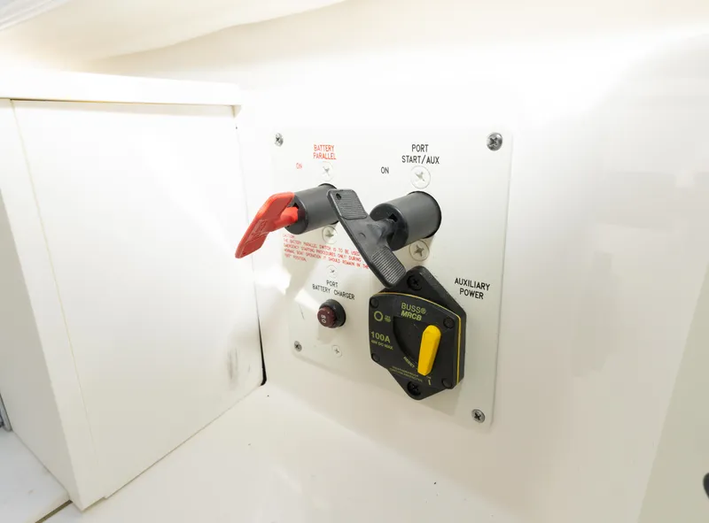 Slide: The Image of Control panel of a 2017 Formula 382 FASTech boat with safety toggle and auxiliary power switch. - 32