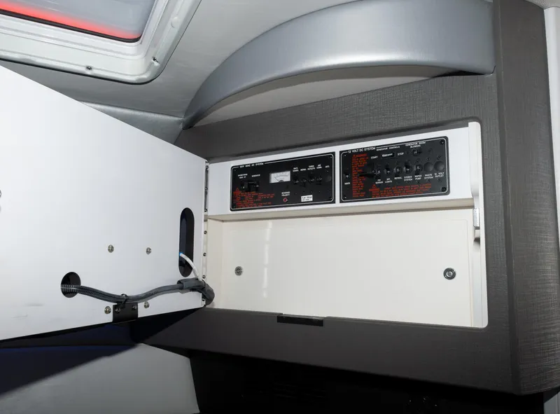 Slide: The Image of Control panel inside 2017 Formula 382 FASTech boat, featuring switches and wiring. - 34