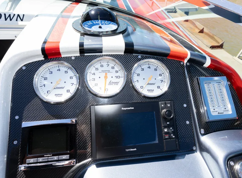 Slide: The Image of Dashboard of a 2017 Formula 382 FASTech boat with gauges and navigation system. - 7