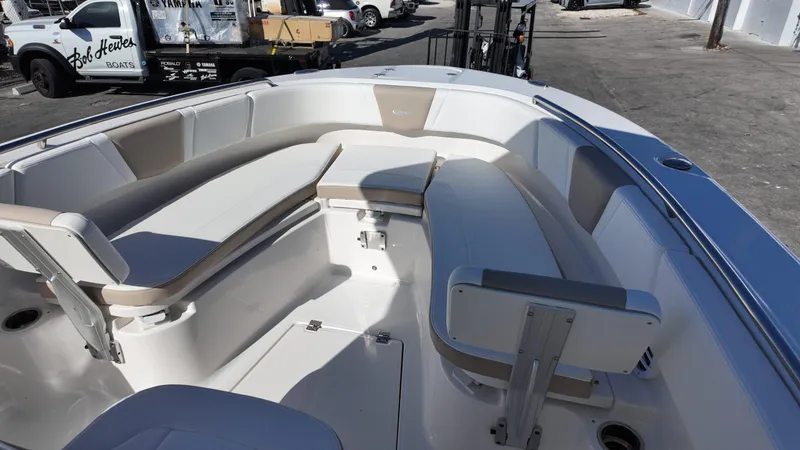 Slide: The Image of 2025 Robalo R250 boat interior with spacious seating and modern design. - 7
