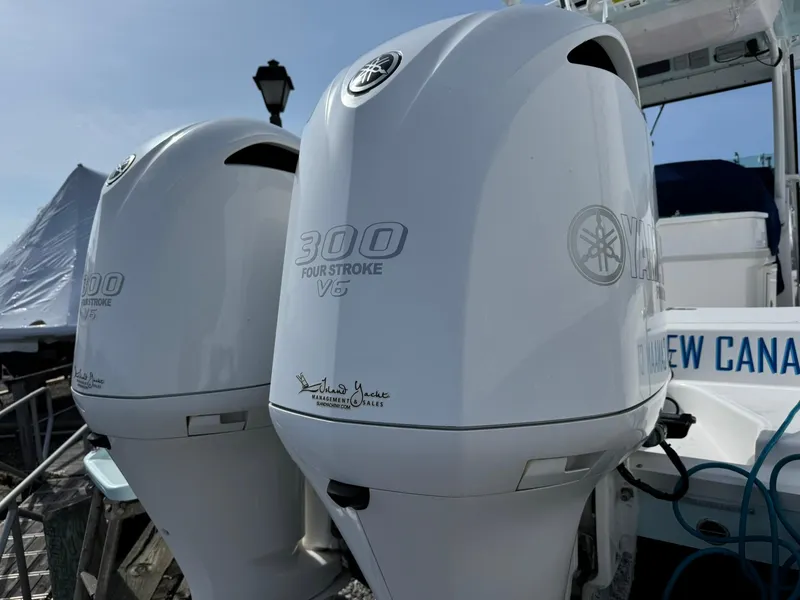 Slide: The Image of Twin Yamaha 300 outboard engines on a 2019 Everglades 273 CC boat. - 13