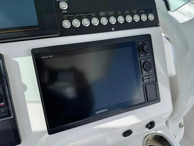 Slide: The Image of Garmin display on 2019 Everglades 273 CC boat dashboard with control panel. - 20