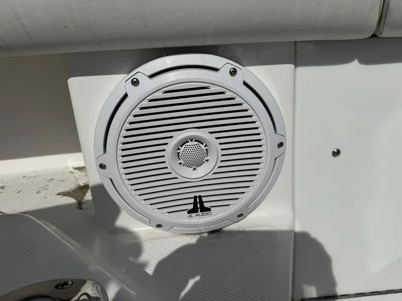 Slide: The Image of White JL Audio speaker on 2019 Everglades 273 CC boat. - 27