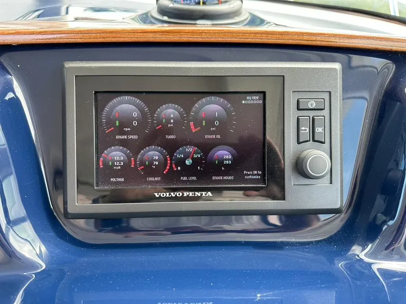 Slide: The Image of TIARA 31' Coronet; Volvo Diesel command center at helm - 10
