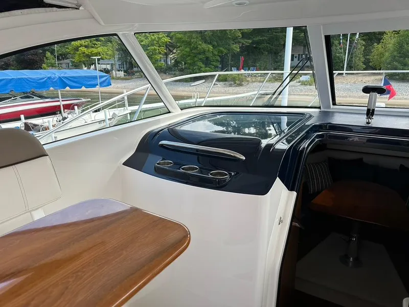 Slide: The Image of TIARA 31' Coronet; Companion side lounge, seating w/table - 13
