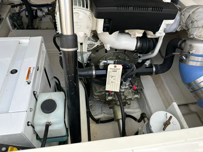 Slide: The Image of TIARA 31 Coronet; Engine compartment, generator, fuel filter, shaft logs - 16