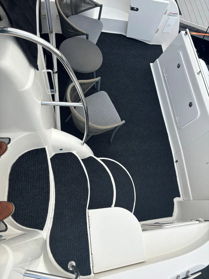 Slide: The Image of 2007 Meridian 459 Motoryacht interior with carpeted steps and seating area. - 11