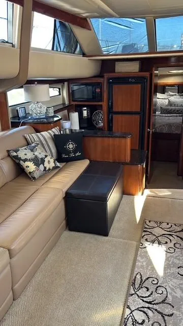 Slide: The Image of Luxurious interior of a 2007 Meridian 459 Motoryacht with elegant seating and decor. - 19