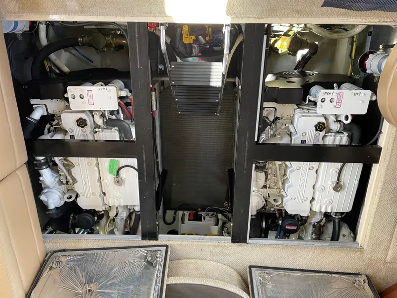 Slide: The Image of Engine room of 2007 Meridian 459 Motoryacht, showcasing dual engines and mechanical components. - 35