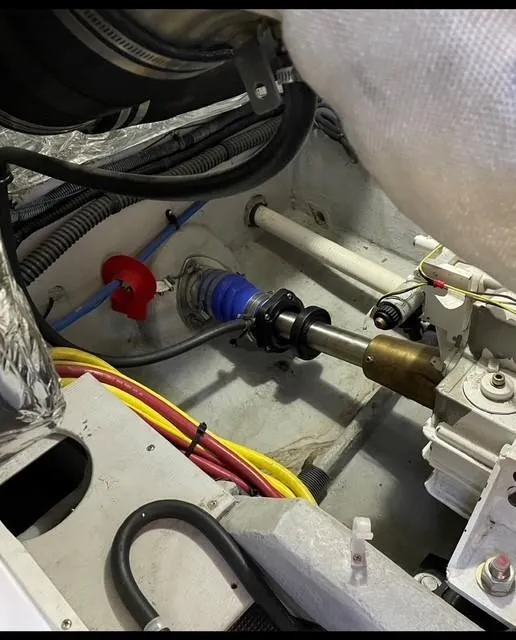Slide: The Image of Engine compartment of 2007 Meridian 459 Motoryacht, showing mechanical components and wiring. - 36