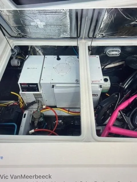 Slide: The Image of Engine compartment of a 2007 Meridian 459 Motoryacht with visible generator and wiring. - 37