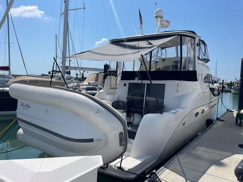 Slide: The Image of 2007 Meridian 459 Motoryacht docked at marina under clear blue sky. - 5