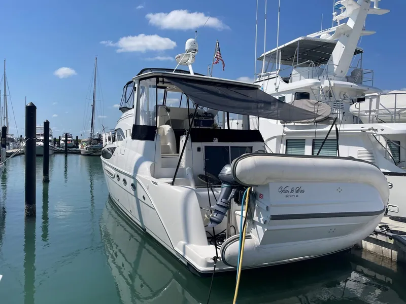 Slide: The Image of 2007 Meridian 459 Motoryacht docked at marina under clear blue sky. - 6