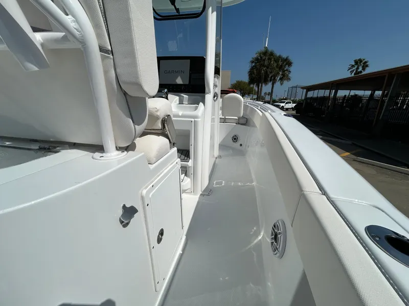 Slide: The Image of 2025 Sea Hunt Gamefish 25 boat interior with sleek white design and modern features. - 16