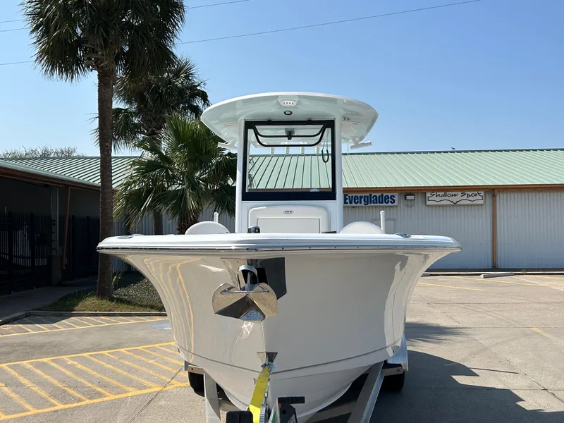 Slide: The Image of 2025 Sea Hunt Gamefish 25 boat in a sunny outdoor setting. - 7