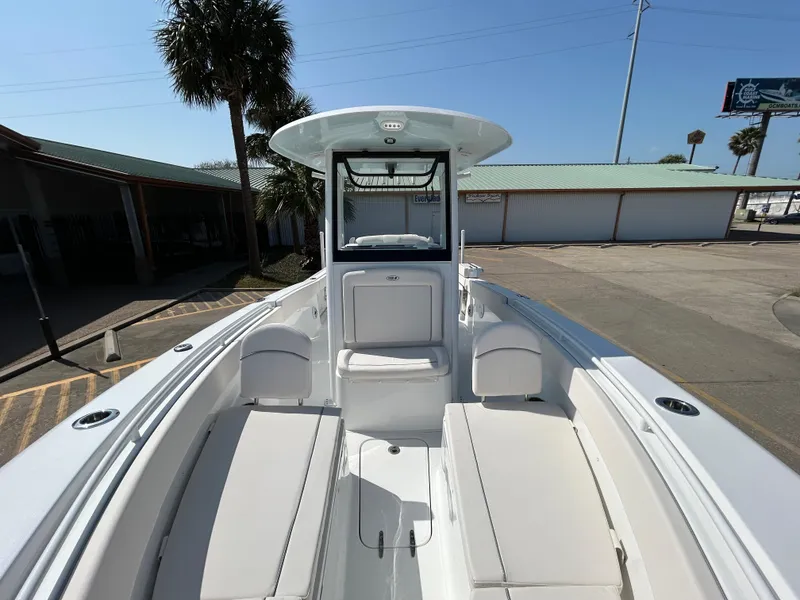 Slide: The Image of 2025 Sea Hunt Gamefish 25 boat with spacious seating and modern design. - 8