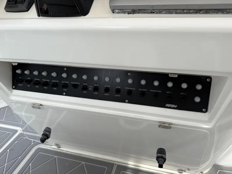 Slide: The Image of Control panel of a 1999 Intrepid 339 Walkaround boat with Yamaha 300 4-stroke engines. - 19