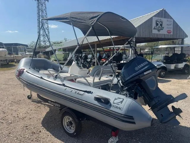 Slide: The Image of 2019 Zodiac Bayrunner 420 inflatable boat with Yamaha engine on trailer. - 1