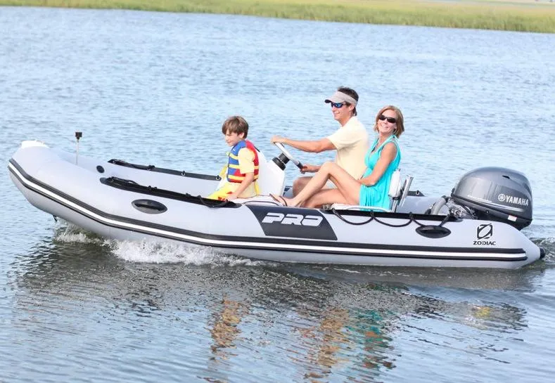 Slide: The Image of 2019 Zodiac Bayrunner 420 boat cockpit with steering wheel and control panel. - 11