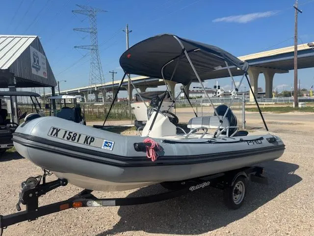 Slide: The Image of 2019 Zodiac Bayrunner 420 inflatable boat with Yamaha motor on trailer. - 5