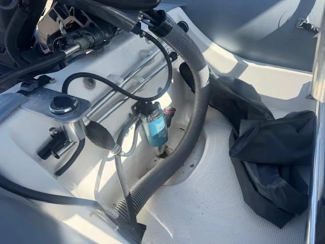 Slide: The Image of 2019 Zodiac Bayrunner 420 inflatable boat interior with seating and red fuel tank. - 8