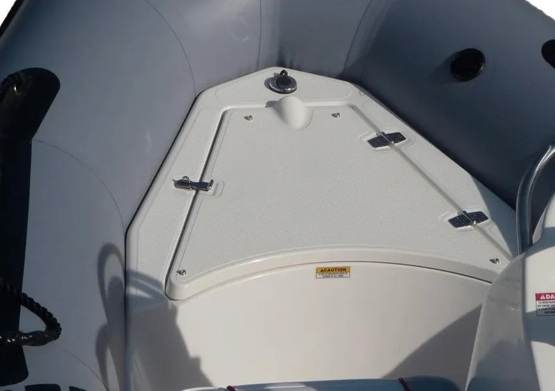 Slide: The Image of 2019 Zodiac Bayrunner 420 boat interior with steering wheel and seating. - 9