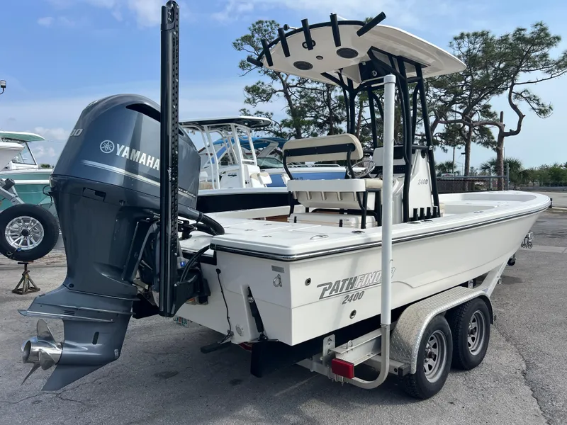 Slide: The Image of 2019 Pathfinder 2400 TRS boat with Yamaha engine on a trailer. - 5