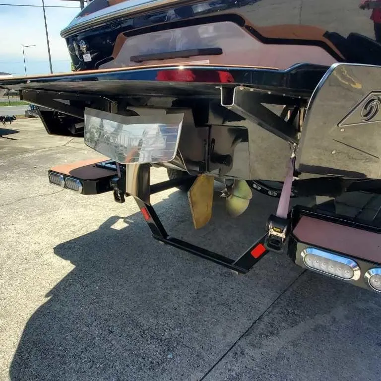 Slide: The Image of Rear view of 2022 Axis Core Series A22 boat, showcasing propeller and hull details. - 3