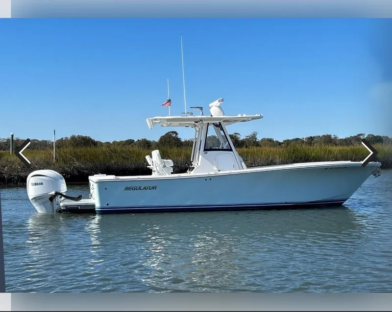 The Image of 2021 Regulator 28FS boat on water with Yamaha outboard motor. - 0