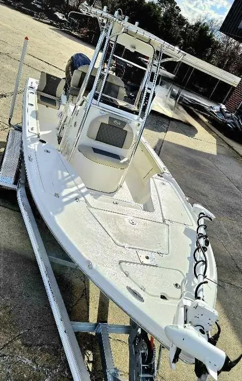 Slide: The Image of 2025 Key West 210 BR boat on trailer, sleek design, ready for adventure. - 3