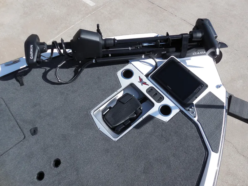 Slide: The Image of 2025 Vexus VXS 21 boat deck with Garmin equipment and control panel. - 11