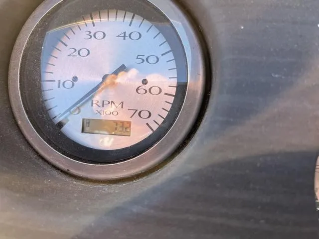 Slide: The Image of Close-up of a 2022 Bennington 23 SSBX RPM gauge displaying engine speed. - 14