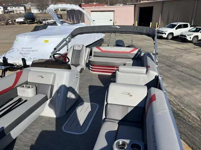 Slide: The Image of 2022 Bennington 23 SSBX pontoon boat with spacious seating and modern design. - 8