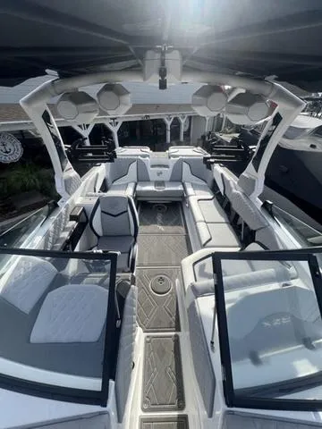 Slide: The Image of 2024 Tigé 24RZX boat interior with modern seating and sleek design. - 3