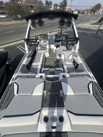 Slide: The Image of 2024 Tigé 24RZX boat interior with modern seating and sound system. - 4