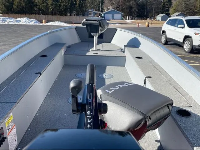 Slide: The Image of 2025 Lund Fury 1600 Tiller Heritage Edition boat interior with seating and controls. - 13