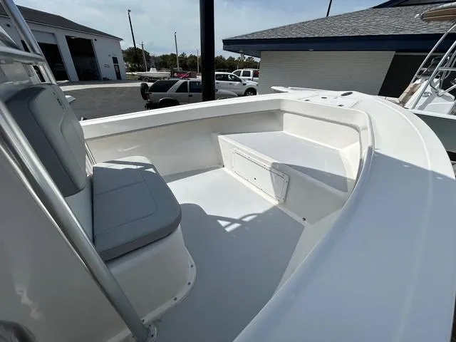 Slide: The Image of 2025 May-Craft 2000 Cape Classic boat interior with seating and storage. - 12