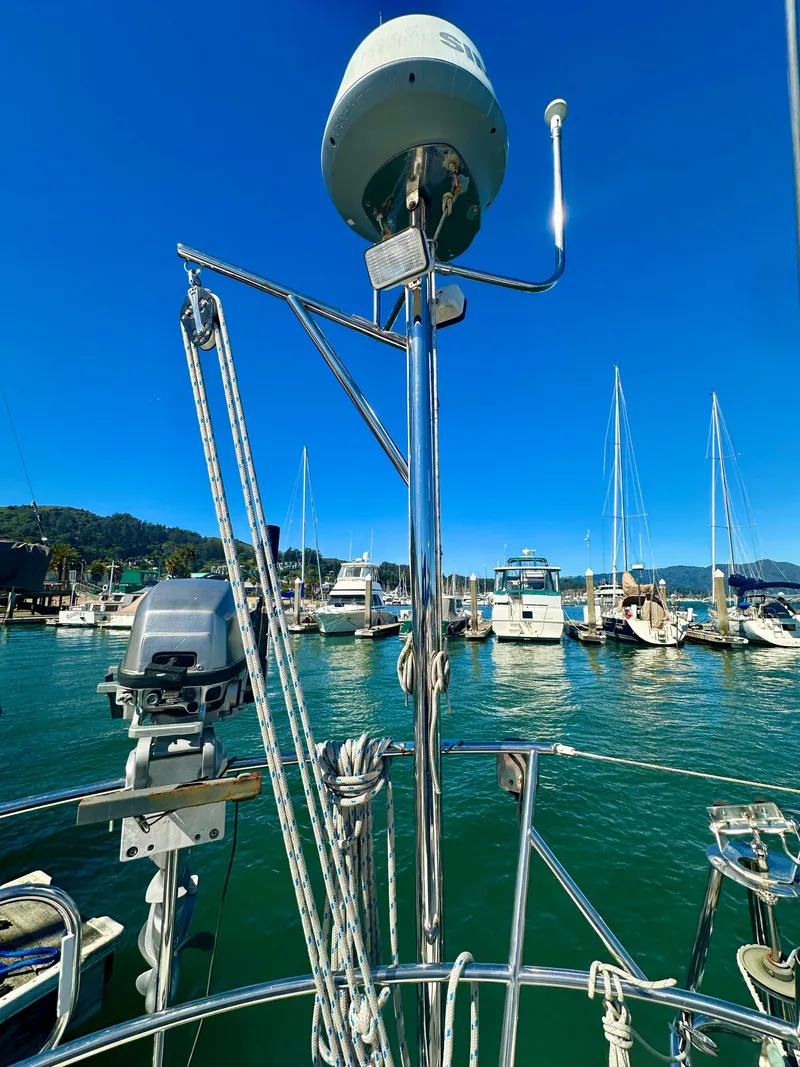 Slide: The Image of Sailboat Valiant 39, 1996 model, docked in marina with clear blue sky. - 12