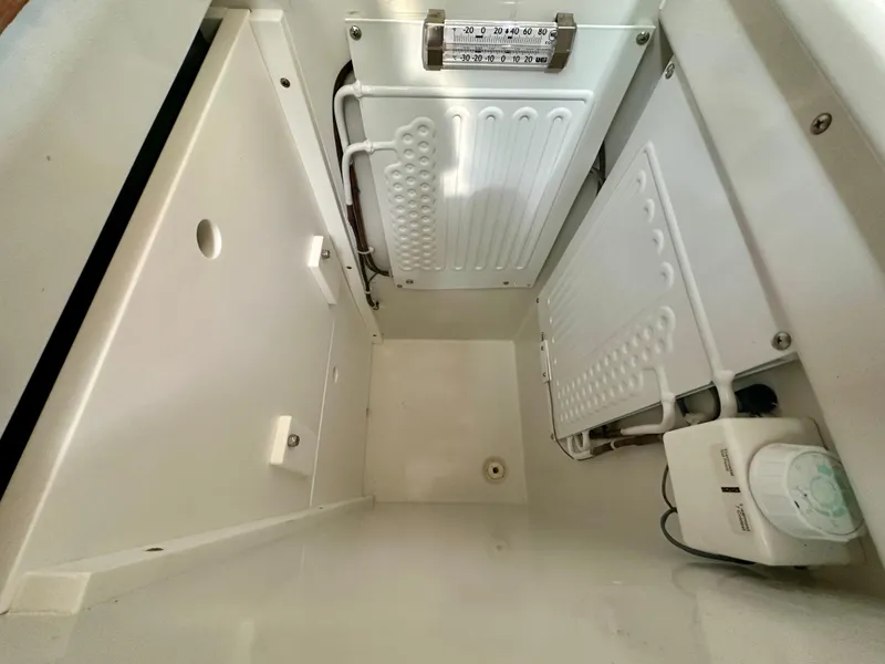 Slide: The Image of Interior view of a 1996 Valiant 39 refrigerator compartment with cooling elements. - 34
