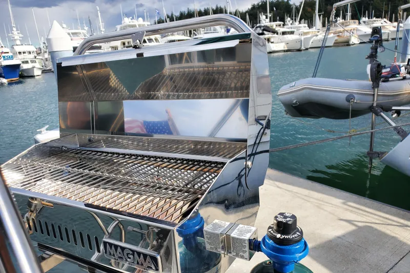 Slide: The Image of Outdoor grill on a 1986 Catalina 36 yacht docked at a marina. - 34