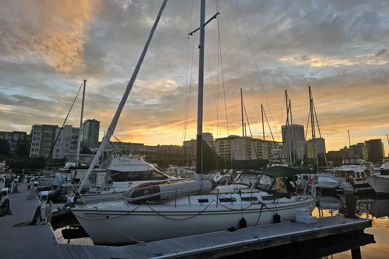 Slide: The Image of Catalina 36 sailboat docked at marina during sunset, 1986 model. - 48