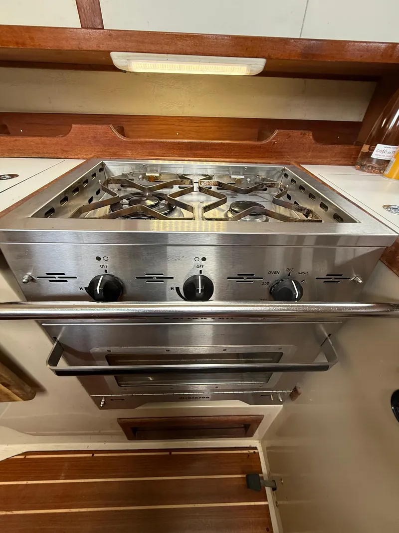 Slide: The Image of Stainless steel stove and oven in 1986 Catalina 36 yacht kitchen. - 8