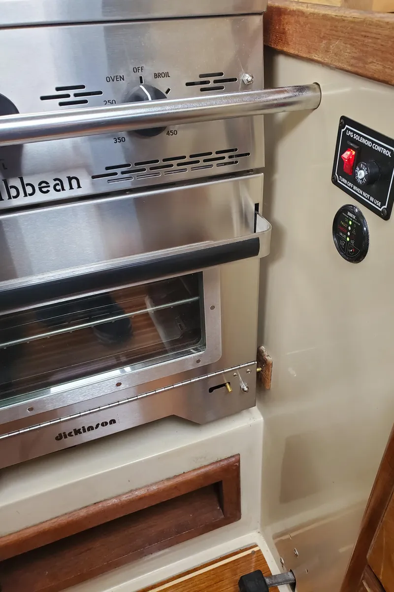 Slide: The Image of Stainless steel oven in a 1986 Catalina 36 yacht kitchen interior. - 9