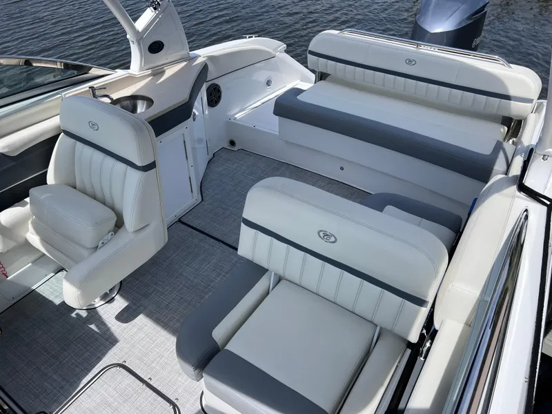 Slide: The Image of 2019 Cobalt 25 SC boat interior with plush seating, fresh water use, Yamaha 300 engine. - 15