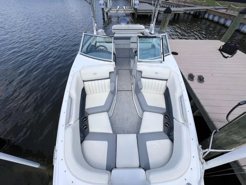 Slide: The Image of 2019 Cobalt 25 SC boat with Yamaha 300 engine, fresh water use, docked by a pier. - 23